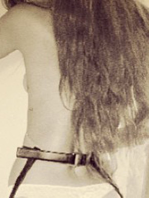 Sexy Pic! Nearly Naked Rihanna Poses in Thong and Thigh-High Boots