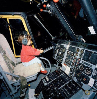 Pics! Never-Before-Seen Photos of a Young JFK Jr. Playing in Cockpit