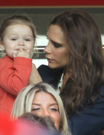 Victoria Beckham and daughter Harper watched David Beckham play his last soccer game in Paris.