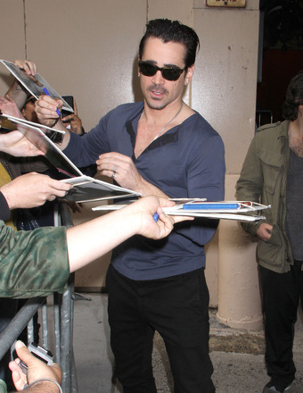 Colin Farrell signed autographs for fans after appearing on "Live with Kelly and Michael" in NYC on Monday.