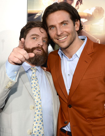 Zach Galifianakis and Bradley Cooper caught up at the “Hangover 3” premiere in Hollywood on Monday.