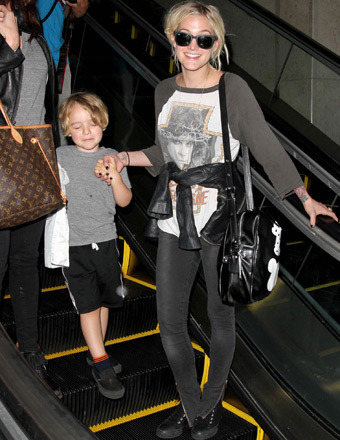 Ashlee Simpson rocked an Ozzy Osbourne t-shirt as she arrived to LAX with son Bronx.