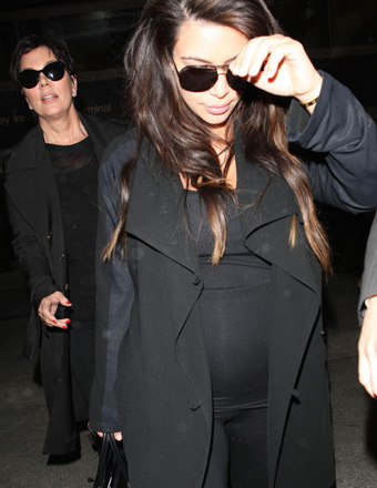 Kris Jenner and Kim Kardashian were dressed in all black when they touched down at LAX on Thursday.