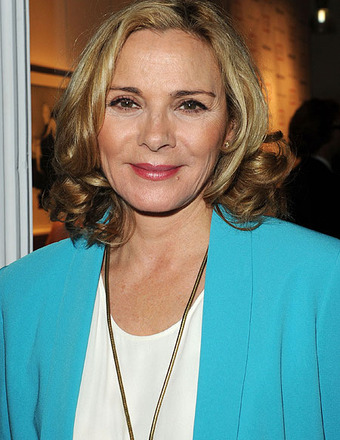 Kim Cattrall Adopts New ‘Fizzy Yoga’ Fitness Trend