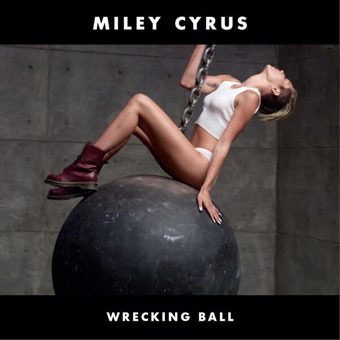 Miley Cyrus Does It Again… Naughty and Nearly Naked on a Wrecking Ball