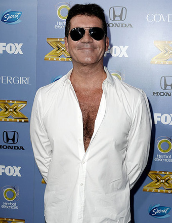Simon Cowell Jokes About Diaper Duty