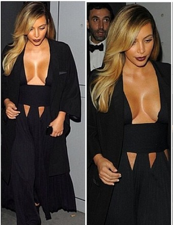 Kim K 'Hangs Out' in Paris, Flashes Cleavage