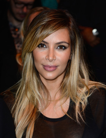 Masked Beauty: Kim Kardashian is Camera Shy Leaving Salon