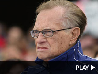Larry King and Katie Couric