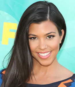 Kourtney Kardashian loves to show off her bump while nude!
