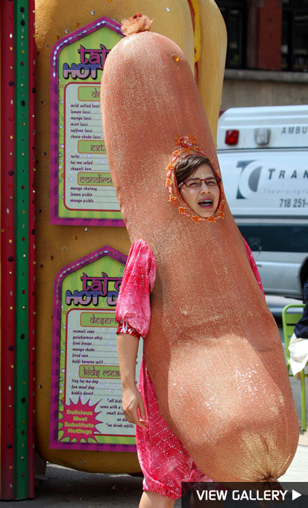 America Ferrera sports a hot dog costume in the New York City humidity.